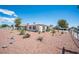 Home with desert landscaping, creating a sustainable and low-water garden at 4412 Baxter Pl, Las Vegas, NV 89107