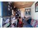 Image shows a living room with a couch, desk, and a variety of decorations at 4412 Baxter Pl, Las Vegas, NV 89107