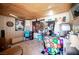 Image of the living room features a lounge area, decorative art and overhead lighting at 4412 Baxter Pl, Las Vegas, NV 89107