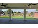 Covered patio provides shade and a great view of the backyard putting green at 4844 E Cactus Canyon Dr, Pahrump, NV 89061