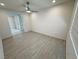 Bright bedroom with hard surface floors, ceiling fan, and minimalist décor at 4844 E Cactus Canyon Dr, Pahrump, NV 89061