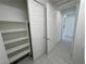 A view of a walk-in closet with shelving and ample storage space at 4844 E Cactus Canyon Dr, Pahrump, NV 89061