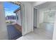 Open entryway reveals bright interior and glimpse of landscaped yard through decorative glass window at 4844 E Cactus Canyon Dr, Pahrump, NV 89061