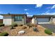 Charming single story home with desert landscaping, attached two car garage, and modern design at 4844 E Cactus Canyon Dr, Pahrump, NV 89061