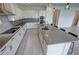 Kitchen featuring a large island with seating and modern appliances at 4844 E Cactus Canyon Dr, Pahrump, NV 89061