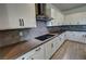 Bright kitchen showcasing granite countertops, tile backsplash and stainless appliances at 4844 E Cactus Canyon Dr, Pahrump, NV 89061
