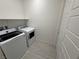 Well-lit laundry room with modern washer and dryer at 4844 E Cactus Canyon Dr, Pahrump, NV 89061