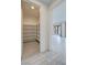 Spacious walk-in pantry featuring ample shelving and wood-look flooring at 4844 E Cactus Canyon Dr, Pahrump, NV 89061