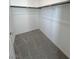 Empty walk-in closet with carpet flooring and wood shelving at 4844 E Cactus Canyon Dr, Pahrump, NV 89061