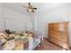 Cozy bedroom featuring wood floors and large closet at 4940 Mascaro Dr, Las Vegas, NV 89122