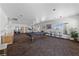 Bright common room with billiards, exercise equipment, and ample seating for residents enjoyment at 4940 Mascaro Dr, Las Vegas, NV 89122