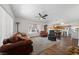 Cozy living room features hardwood floors, ceiling fan, and traditional-style furniture at 4940 Mascaro Dr, Las Vegas, NV 89122