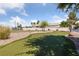 Community putting green with mature trees and drought resistant landscaping and rock ground cover at 4940 Mascaro Dr, Las Vegas, NV 89122