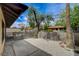 Private backyard featuring desert landscaping and tall block wall fencing at 5020 Village Dr, Las Vegas, NV 89142