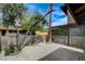 Private backyard featuring desert landscaping and tall block wall fencing at 5020 Village Dr, Las Vegas, NV 89142