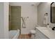 This newly-renovated bathroom features new fixtures, vanity, and shower at 5020 Village Dr, Las Vegas, NV 89142