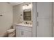 This modern bathroom features a new vanity, sink, mirror and lighting at 5020 Village Dr, Las Vegas, NV 89142