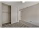 This bedroom features new carpet and a large closet with sliding doors at 5020 Village Dr, Las Vegas, NV 89142