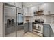 Modern kitchen with stainless steel refrigerator featuring a touchscreen and updated appliances at 5020 Village Dr, Las Vegas, NV 89142