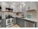 Close-up of updated kitchen with stainless steel appliances and modern cabinetry at 5020 Village Dr, Las Vegas, NV 89142