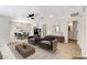 Bright living room featuring stylish furnishings, an open floor plan, and light-colored wood flooring at 5020 Village Dr, Las Vegas, NV 89142