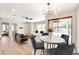 Bright living area with an open concept and modern furnishings, seamlessly connecting to the outdoor space at 5020 Village Dr, Las Vegas, NV 89142