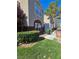 Exterior view of a well-maintained home with manicured lawns and lush landscaping at 5055 W Hacienda Ave # 1161, Las Vegas, NV 89118