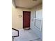 Inviting front door with unit number, a welcome mat, and a sidelight window at 5055 W Hacienda Ave # 1161, Las Vegas, NV 89118