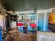 Comfortable living room open to the laundry room, bar, bedroom and entrance at 5055 W Hacienda Ave # 1161, Las Vegas, NV 89118