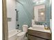 Stylish bathroom featuring unique tilework, a modern vanity, and a shower-tub combo for a relaxing experience at 517 Spruce Canyon St, Las Vegas, NV 89144