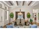 Chic dining room with wooden table, chandelier, and decorative features at 517 Spruce Canyon St, Las Vegas, NV 89144
