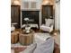Cozy living room featuring a fireplace, decorative wood tables, and modern decor at 517 Spruce Canyon St, Las Vegas, NV 89144