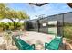 Community tennis and basketball court surrounded by greenery and benches for relaxation and enjoyment at 517 Spruce Canyon St, Las Vegas, NV 89144