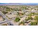Elevated view showcases sprawling suburban area, horse property, and desert landscape at 5180 N Dapple Gray Rd, Las Vegas, NV 89149