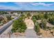 Wide aerial view of home showcasing beautiful landscaping and a large lot at 5180 N Dapple Gray Rd, Las Vegas, NV 89149
