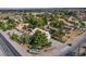 Aerial view showcases a serene residential area, lush greenery, and a glimpse of a boat at 5180 N Dapple Gray Rd, Las Vegas, NV 89149