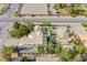 Aerial perspective of a well-kept backyard, horse stables, and green landscaping at 5180 N Dapple Gray Rd, Las Vegas, NV 89149