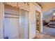 En suite bathroom with glass shower, walk in closet and bedroom with vaulted ceilings at 5180 N Dapple Gray Rd, Las Vegas, NV 89149