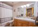 Bathroom featuring a vanity with sink and drawers, and a shower behind a curtain at 5180 N Dapple Gray Rd, Las Vegas, NV 89149