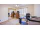 Bedroom with carpet floors, closet with mirrors and natural light from window with blinds at 5180 N Dapple Gray Rd, Las Vegas, NV 89149