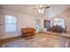 Open floor plan featuring a dining area with piano, large cabinet and stairs at 5180 N Dapple Gray Rd, Las Vegas, NV 89149