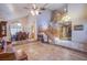 Open floor plan featuring stairs, a dining area, and access to the upstairs floors at 5180 N Dapple Gray Rd, Las Vegas, NV 89149