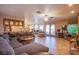 Spacious living room features tile floors, recessed lighting, and comfortable furnishings at 5180 N Dapple Gray Rd, Las Vegas, NV 89149