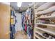 Spacious walk-in closet with ample shelving and storage for an organized wardrobe at 5180 N Dapple Gray Rd, Las Vegas, NV 89149