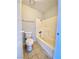 Cozy full bathroom with a tub-shower combo, toilet and towel rack at 5215 Gray Ln, Las Vegas, NV 89119