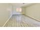 Bright, spacious room with natural light and wood-look floors at 5215 Gray Ln, Las Vegas, NV 89119
