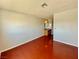 Spacious bedroom with hardwood flooring, natural light and a vanity in the corner at 5215 Gray Ln, Las Vegas, NV 89119