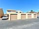 Exterior view of a garage with multiple bays, providing ample parking and storage at 5215 Gray Ln, Las Vegas, NV 89119
