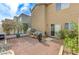Enclosed backyard featuring a white fence, tasteful gravel and drought tolerant landscaping at 5228 Fire Night Ave, Las Vegas, NV 89122