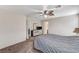 Comfortable bedroom with a ceiling fan, dresser, and neutral-toned walls at 5228 Fire Night Ave, Las Vegas, NV 89122